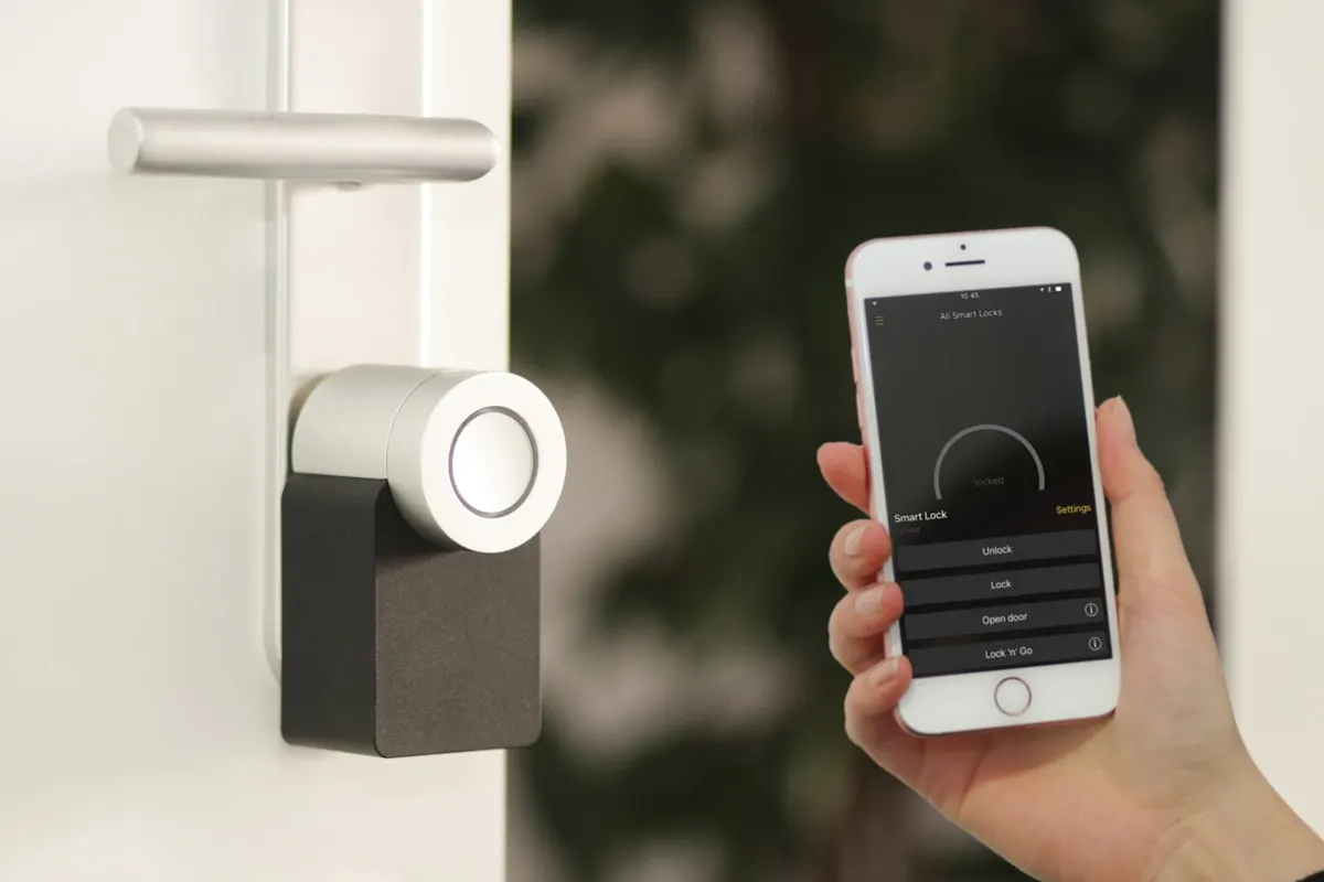 A phone controlling a smart home lock, the kind of setup Zippi walks you through